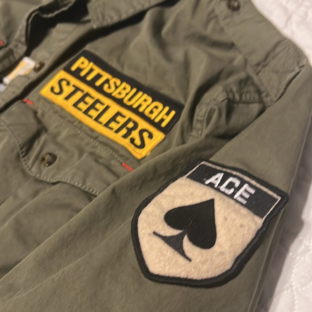 Pittsburgh Steelers Football… unique button up shirt.